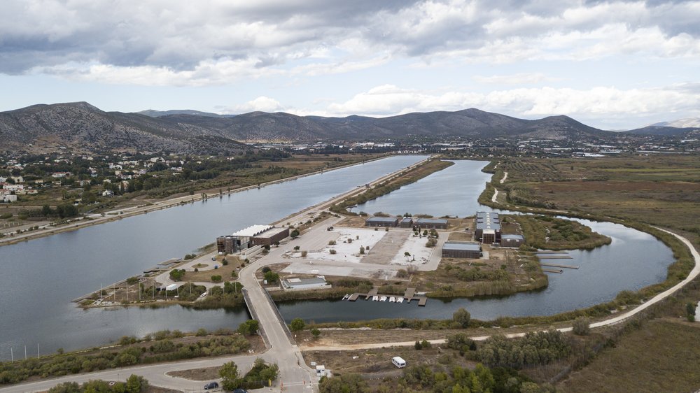 Aerial view of the Schinias Olympic rowing course, two long lanes of still water laid through the wetland of the national park